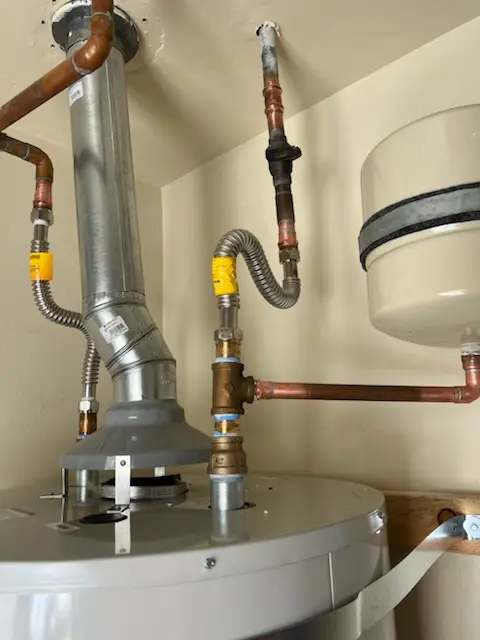 Water heater installation and plumbing repair in Lenah